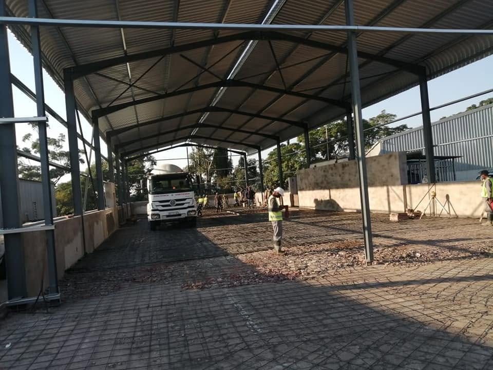 Construction site under a shade structure