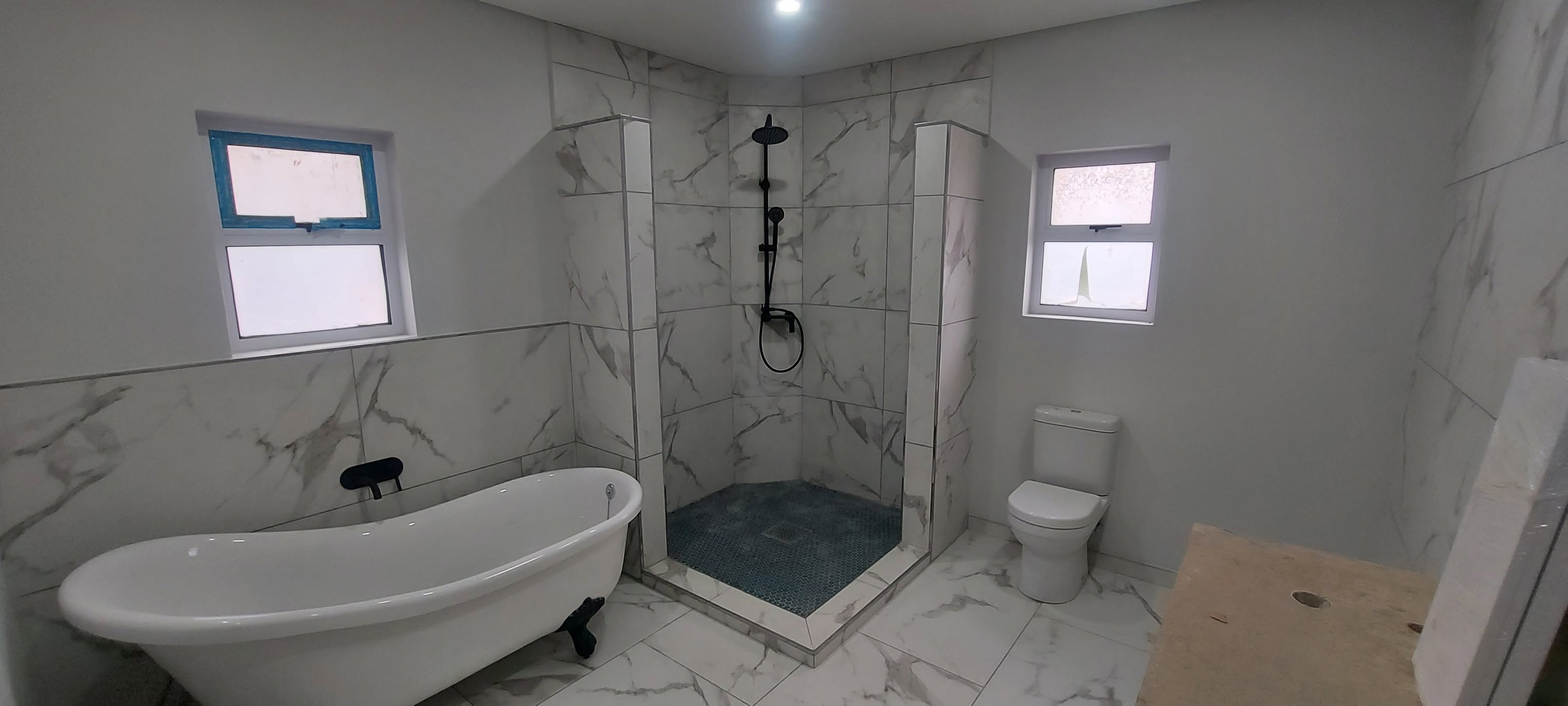 Finished bathroom tiling and fittings